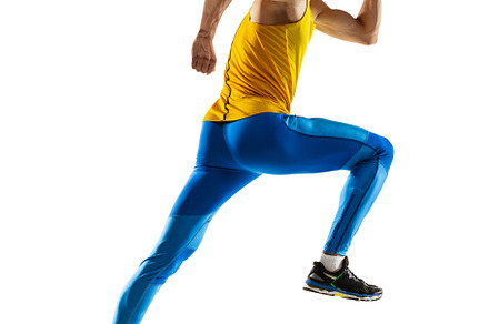 Back view of Caucasian professional male athlete, runner training isolated on w, a Sports & Recreation Photo by Volodymyr Melnyk