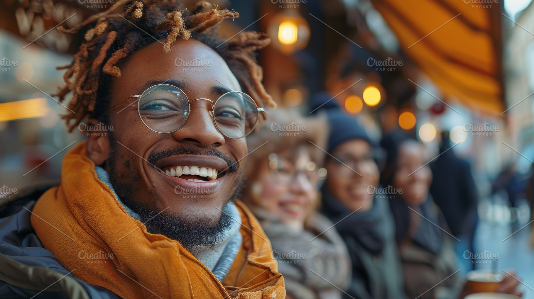 Group of friends laughing and drinking coffee outdoors in a cozy setting, a Photo by AS photostudio