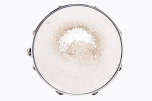 Snare drum over white music featuring drum, snare, and rock