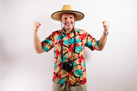 Smiling man ready for tropical vacation adventure