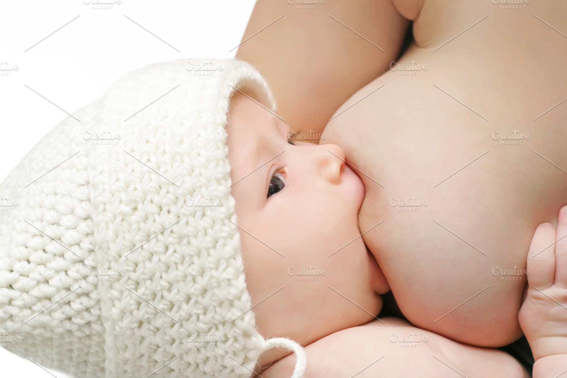 Newborn baby breast feeding, a Photo by saiko3p