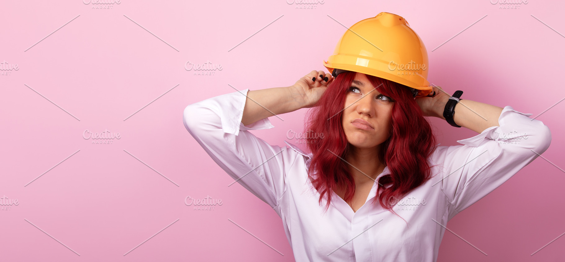 Confident woman in white shirt wearing yellow construction helme, a Person Photo by Ales Munt