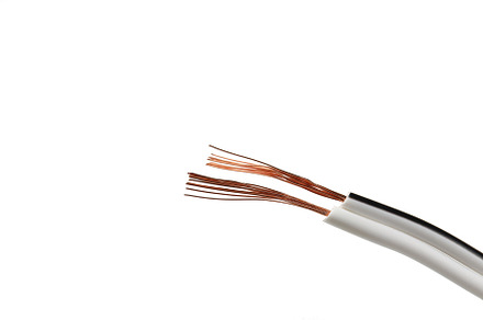 Copper wire isolated on white background, close up, an Industrial Photo by AtlasStudio PRO