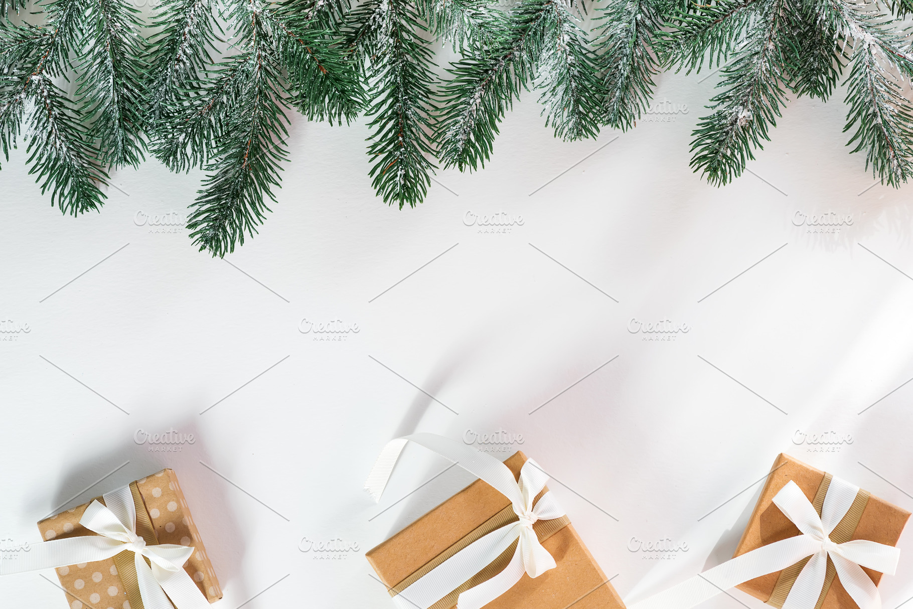 Gift boxes with snow fir branches featuring xmas, card, and background, a Holiday Photo by YuMyart
