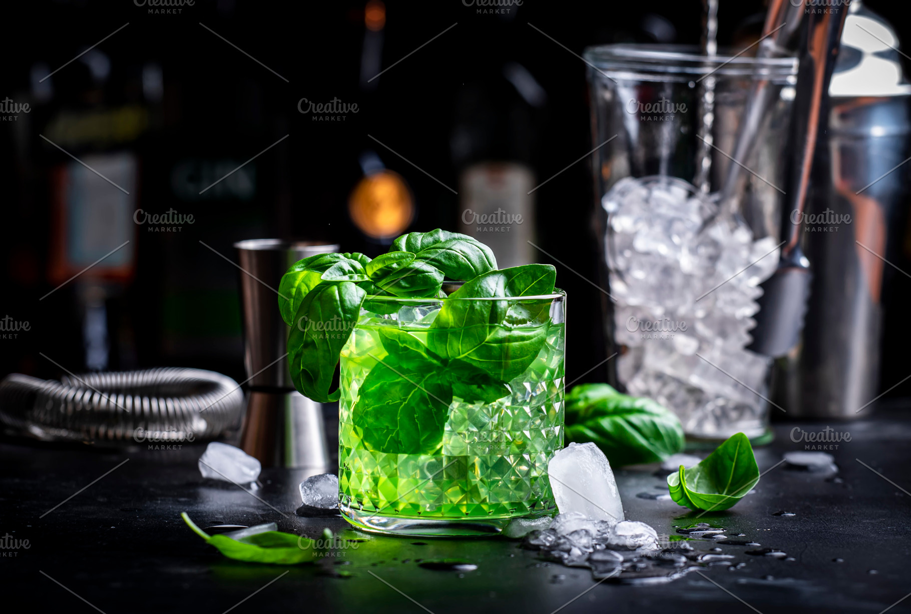 Basil smash green alcoholic cocktail drink with dry gin, sugar s, a Food & Drink Photo by 5PH