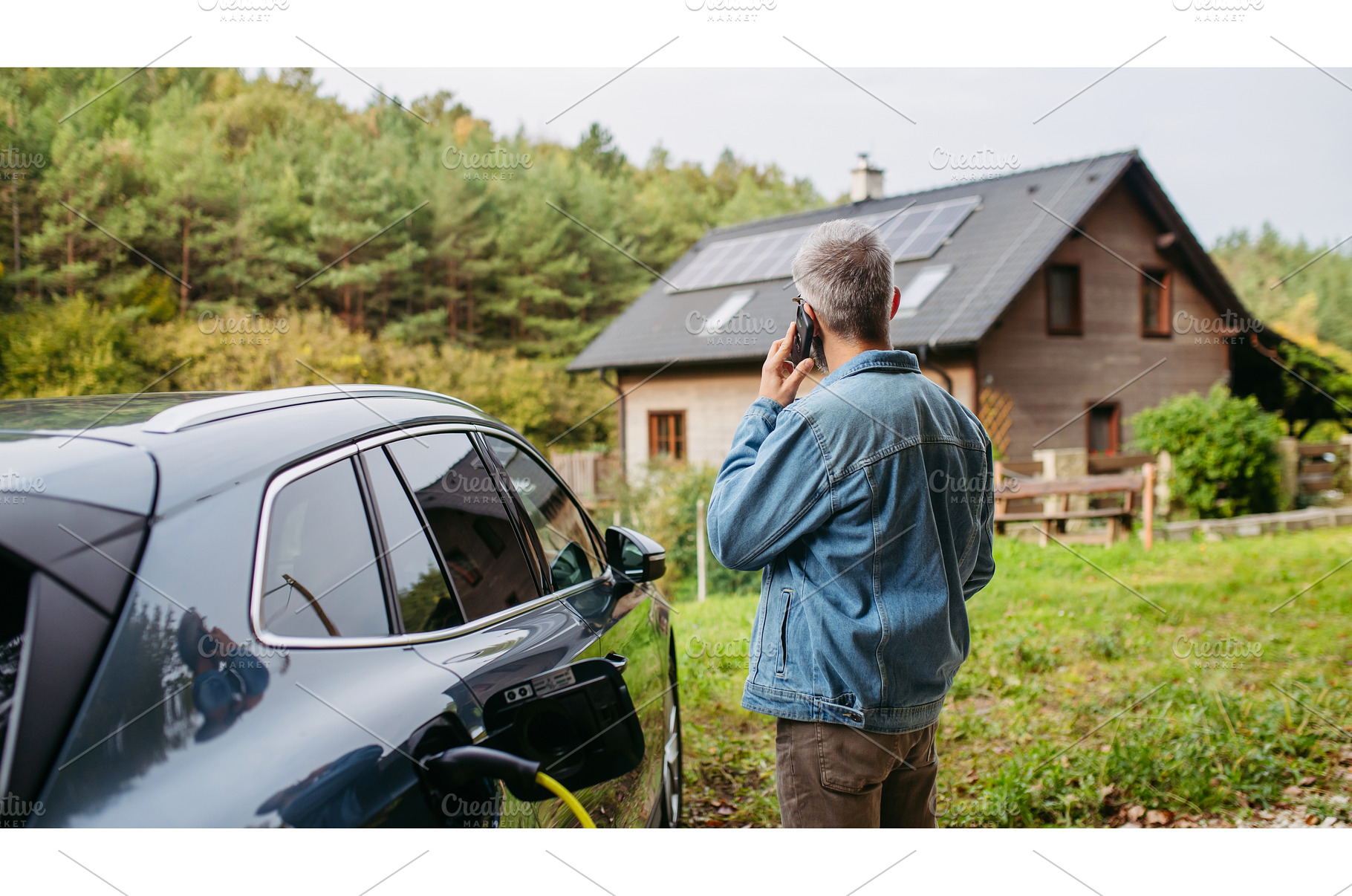 Man charging electric car in front, a Transportation Photo by HalfPoint