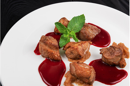 Pork meat with berries sauce, a Food & Drink Photo by Jan Jack Russo Media