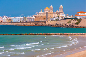 Cadiz cathedral skyline and sandy, an Architecture Photo by kavalenkava