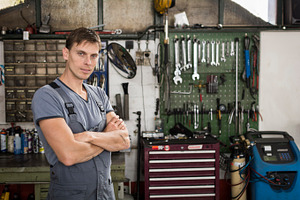 Garage worker stock photo containing automotive and dirty