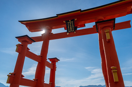 Close-up view of the famous Itsukushima shrine red torii gate in