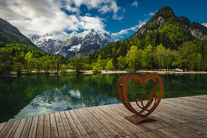 Symbol of the love on the pier, a Nature Photo by Alpine Dreams