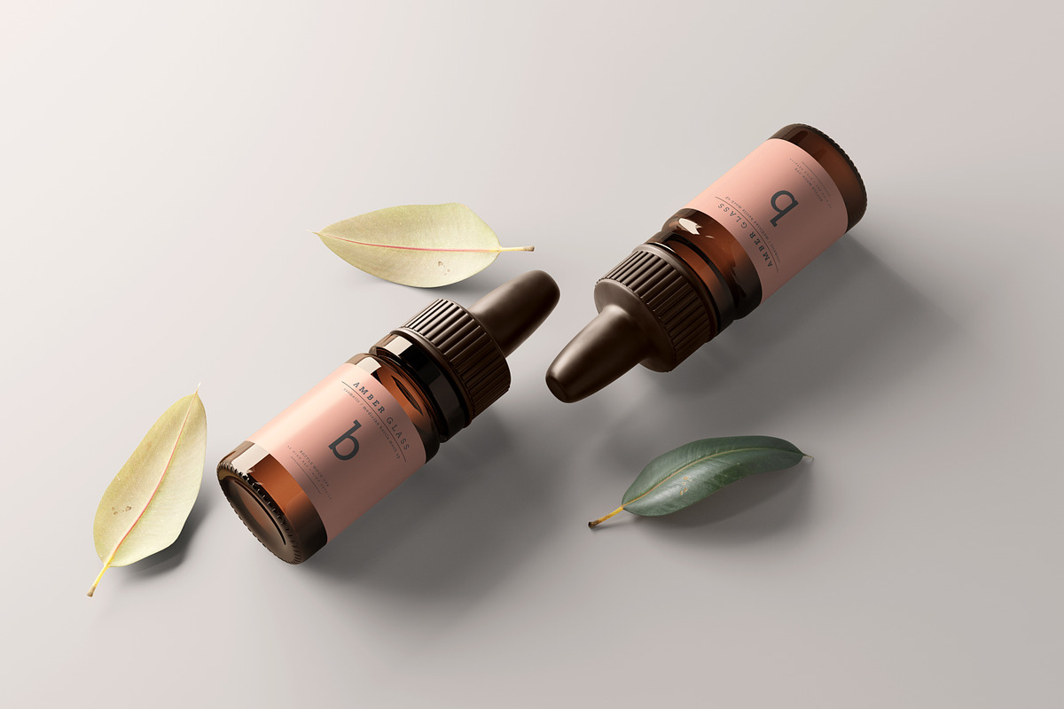 Amber Glass Dropper Bottle Mockups, a Cups & Container Mockup by pmvch (Photo 13 of 20)