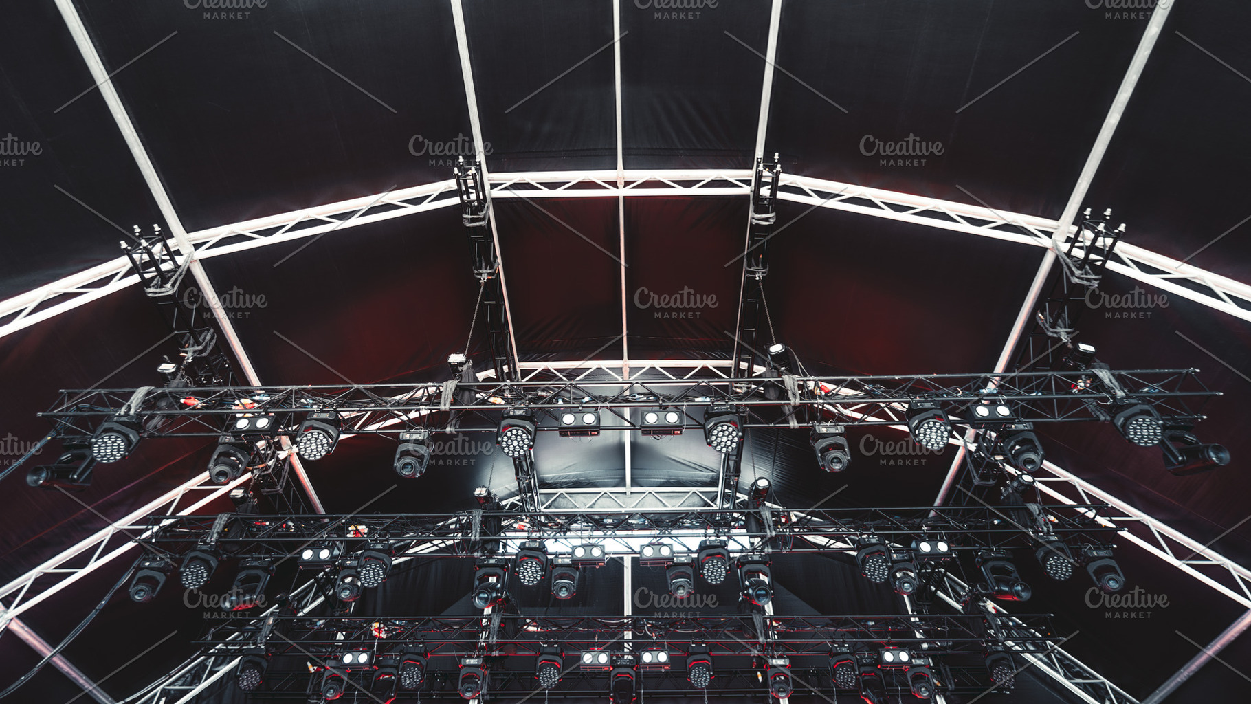 Concert stage lighting rig setup, a Technology Photo by SkyNext