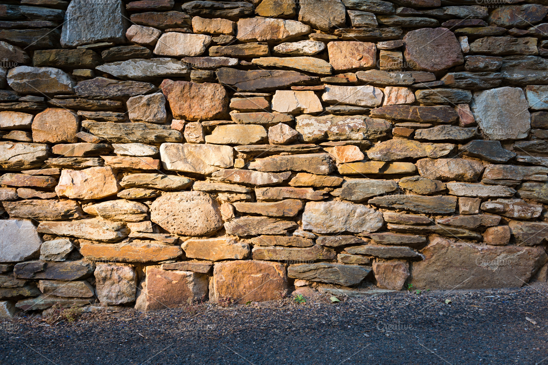 Stacked Stone Wall, a Background Photo by THP Creative