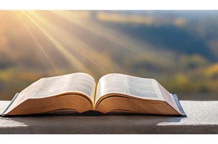 Open book on a table with rays of, a School & Education Photo by Igor Tichonow