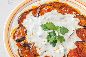 Burani Bonjan Afghan eggplant dish with yogurt garlic sauce and, a Food & Drink Photo by Alexander Prokopenko