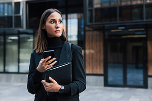 Confident and serious woman, a Business Photo by Artem Varnitsin