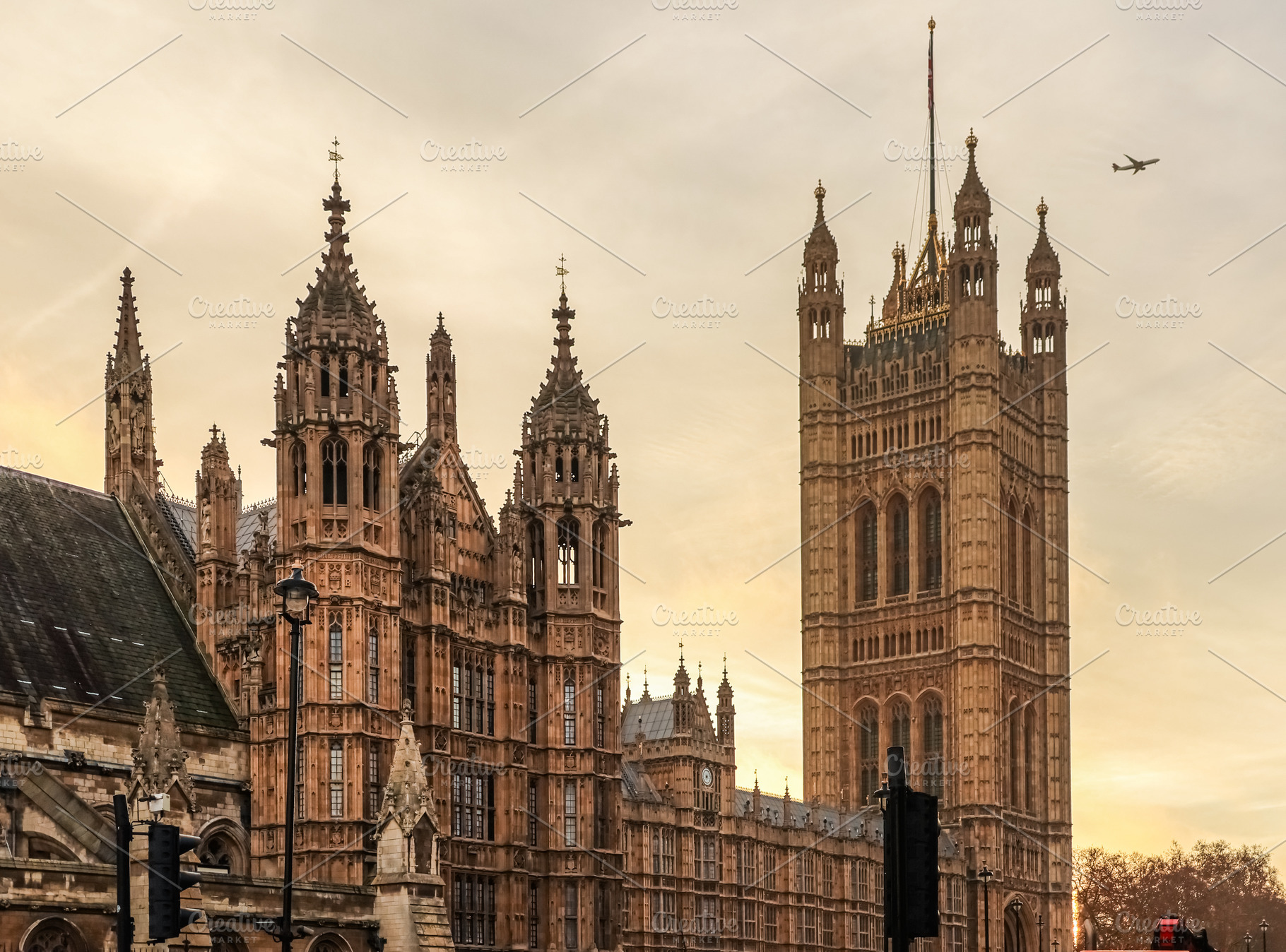 Palace of Westminster and Victoria Tower at sunset, London sky with airplane, H, a Photo by Studio ANNA