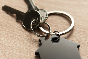 Keys with house shape keychain representing home ownership, a Business Photo by Olena Rudo