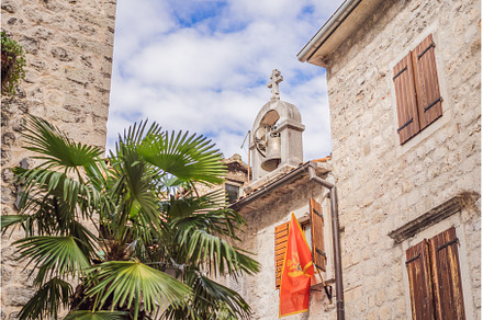 Colorful street in Old town of Kotor, an Architecture Photo by Elizaveta Galitskaya