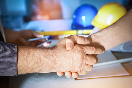 Construction engineers handshake stock photo containing handshake and, a Business Photo by Photocreo Michal Bednarek
