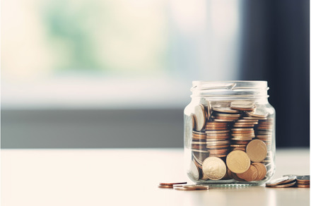 Coins inside jar. Generate Ai, a Business Photo by Ylivdesign