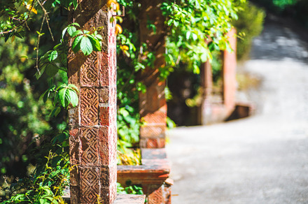 Ornate column with garden path