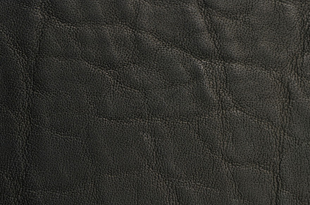 Cowhide black leather surface, a Background Photo by PixieMe