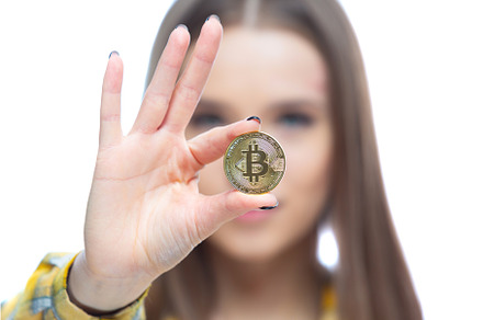 Close up shot of a physical bitcoin