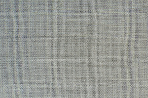 Linen fabric background containing bag, braid, and close