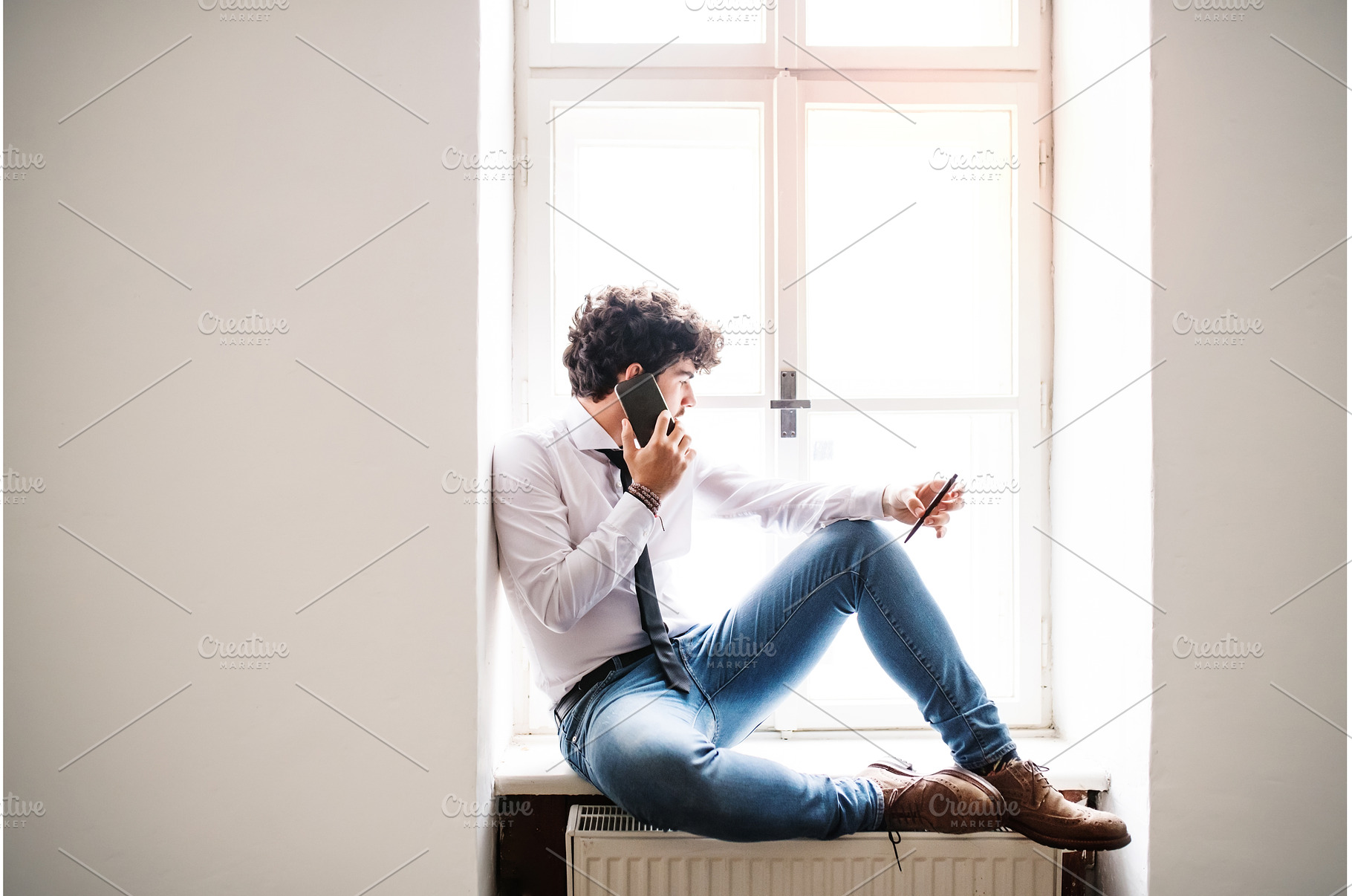 Young businessman working on new, a Business Photo by HalfPoint