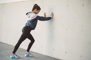 Runner woman containing stretching, woman, and fitness