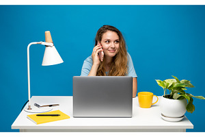 Young woman speaking mobile phone, a Person Photo by volodymyrshtun13795