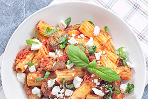Rigatoni alla Norma pasta with eggplant, tomato, basil, ricotta salata, vertica, a Food & Drink Photo by iuliia_n