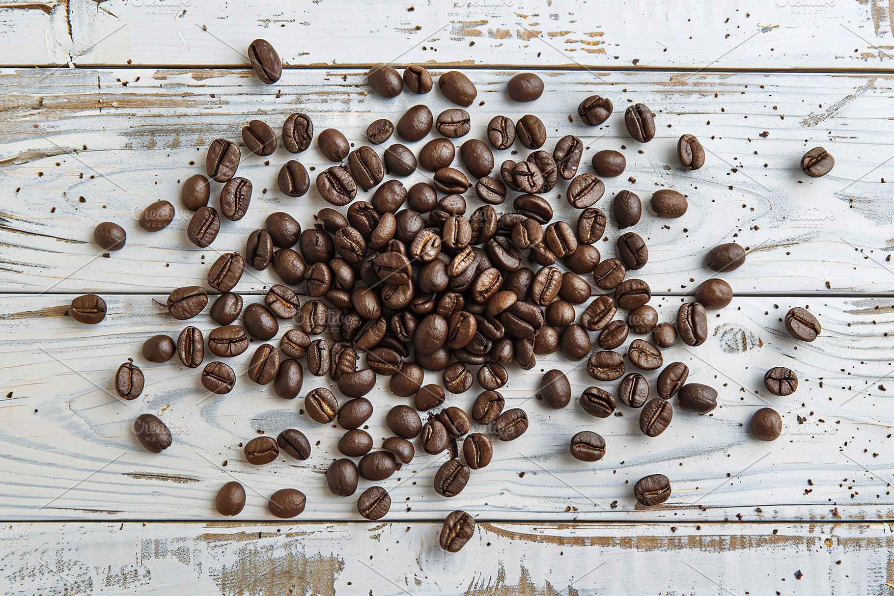 Heap of coffee beans on wooden table, a Food & Drink Photo by AlyaAnd