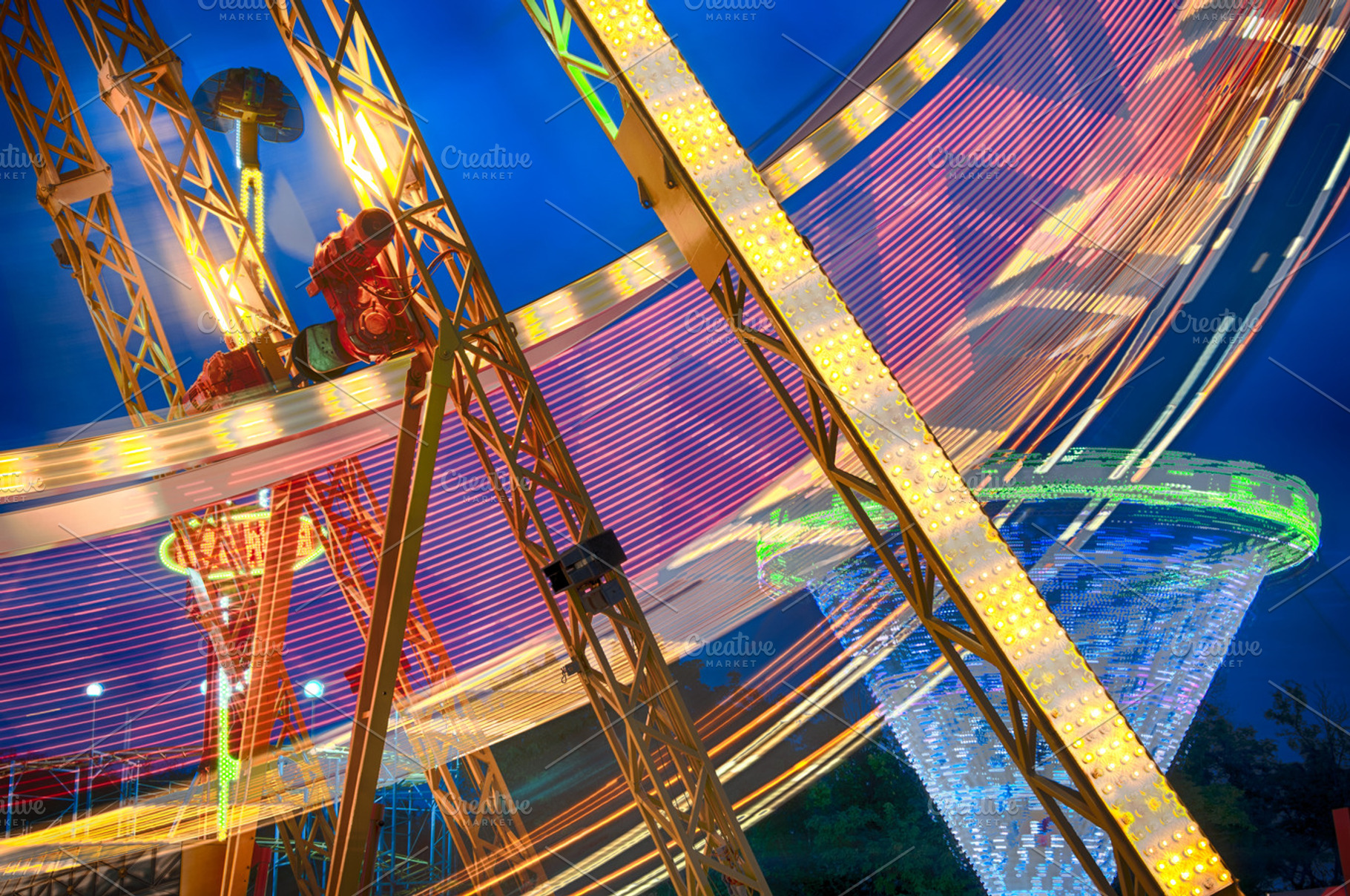 Attractions at night containing wheel, ferris, and night