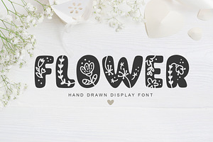 Flower Hand Drawn display Font, a Script Font by Happy Letters
