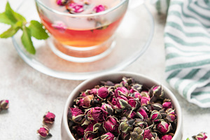 Rosebud herbal tea with dried flowers and mint, a Food & Drink Photo by Olena Rudo