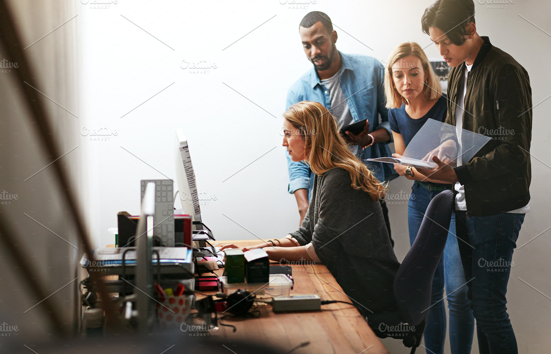 Blending their talents to drive productivity, a Photo by Peopleimages.com
