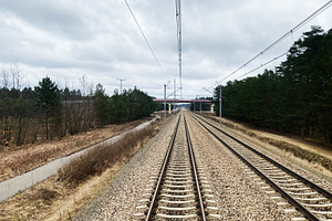 Railway Tracks Amid Nature Near Krakow Poland on a Cloudy Day, a Photo by AS photostudio