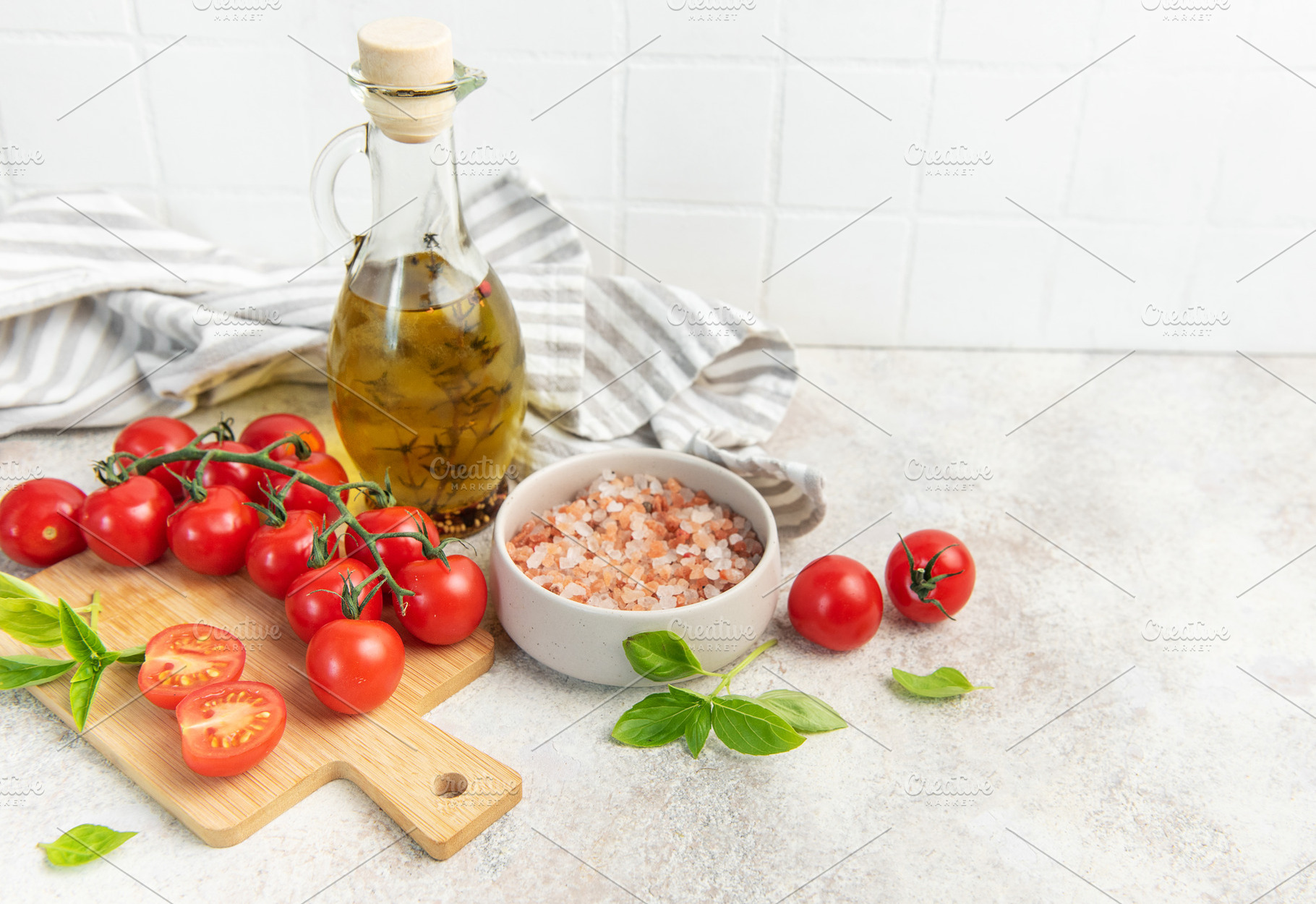 Fresh cherry tomatoes basil olive oil cooking ingredients, a Food & Drink Photo by Olena Rudo
