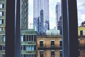 C i t y w i n d o w featuring building, city, and ny