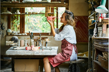 Female artist decorating and, an Arts & Entertainment Photo by Gladkov photography