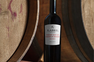 Wine Bottle on a Barrel Label Mockup