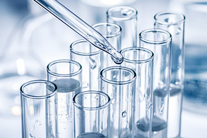 Different laboratory beakers and glassware., an Industrial Photo by Volff
