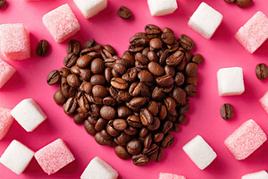 Creative heart shape made with coffee beans surrounded by sugar cubes on a pink, a Food & Drink Photo by AlyaAnd