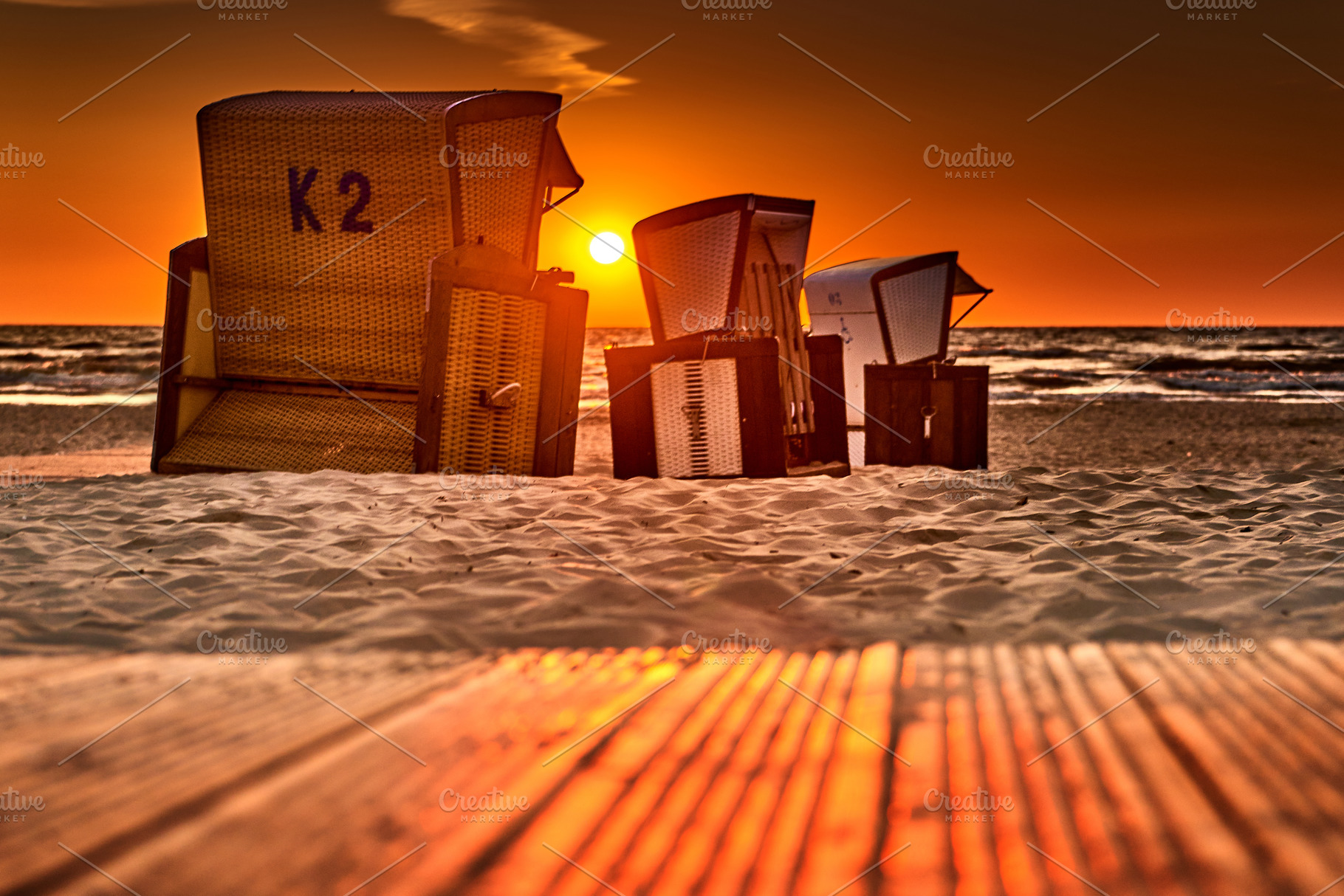 beach chairs on the island of usedom in the sunrise, a Nature Photo by Fotowunsch - photography 
