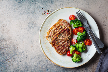 Grilled pork steak with broccoli, a Food & Drink Photo by vaaseenaa