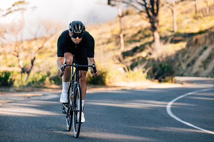 Professional cyclist outdoors, a Sports & Recreation Photo by Artem Varnitsin