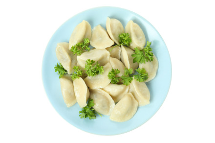 Plate of vareniki or pierogi isolated on white background, a Food & Drink Photo by AtlasStudio PRO